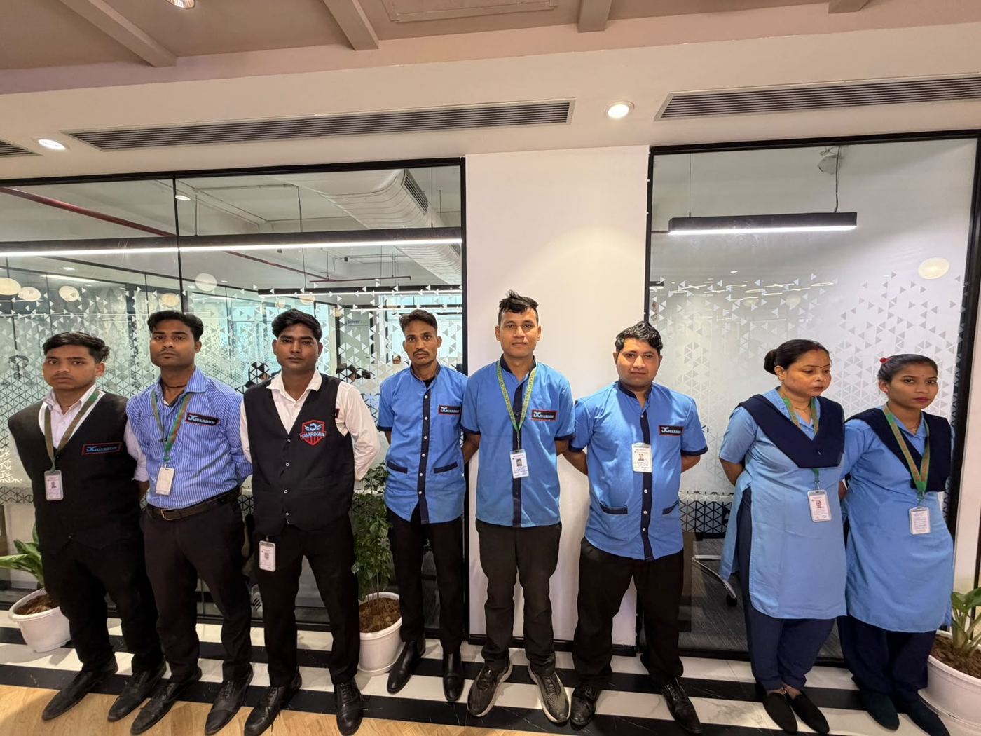 Front desk and housekeeping team at a corporate office
